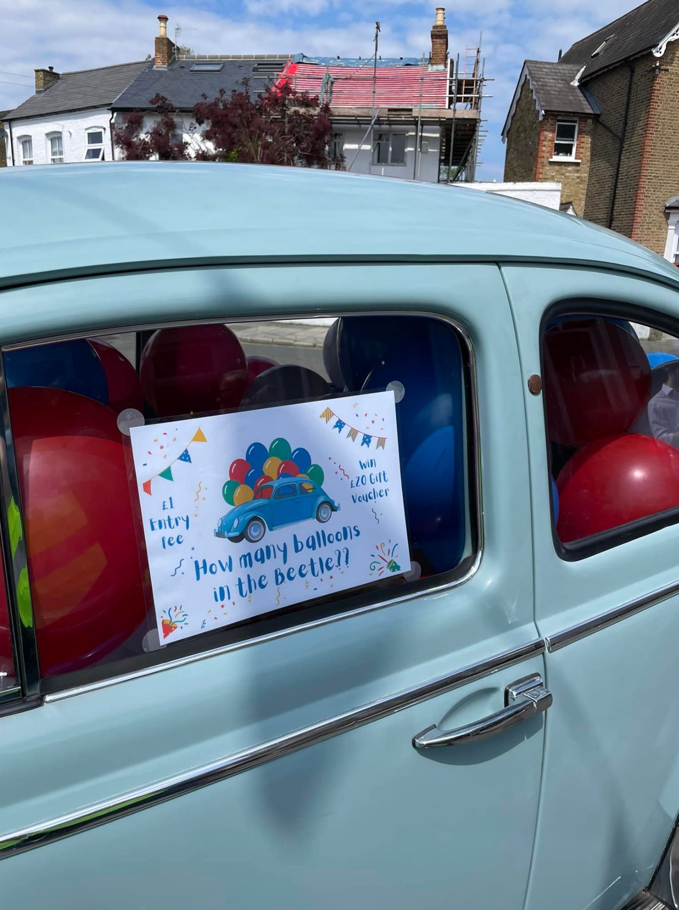 Beetle with balloons